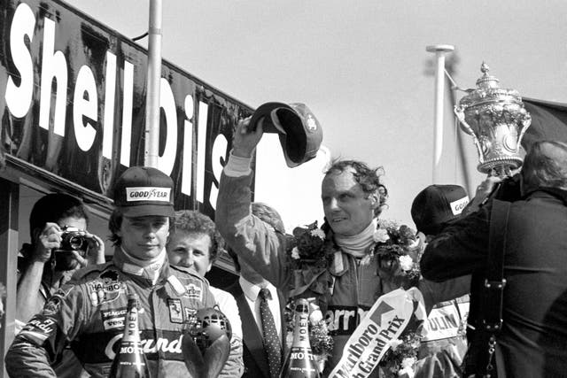 Lauda celebrates victory in the 1982 British Grand Prix at Brands Hatch after winning in his McLaren-Ford 