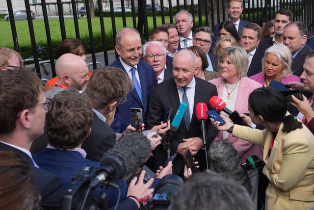 Micheal Martin, centre left, and Jim Gavin, centre, speaking to the media 