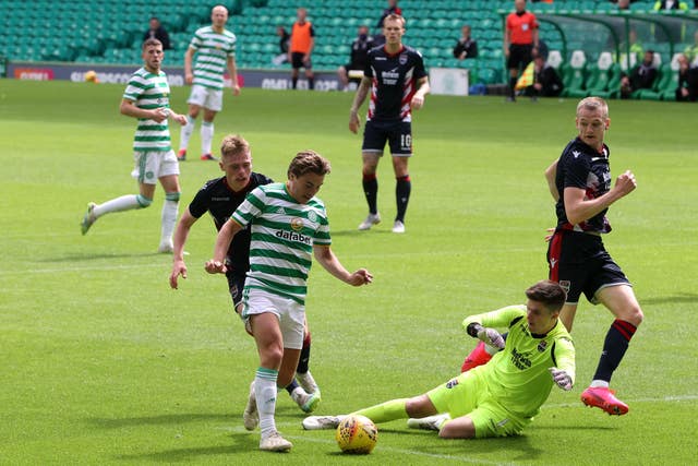 Ross Doohan saves from team-mate James Forrest 