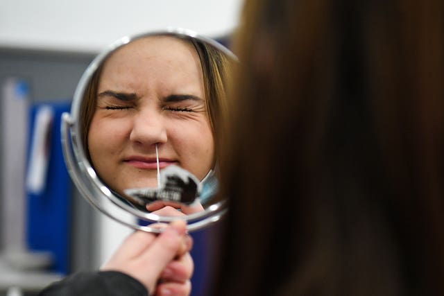 A student taking a lateral flow test at Hounslow Kingsley Academy in West London (Kirsty O'Connor/PA)