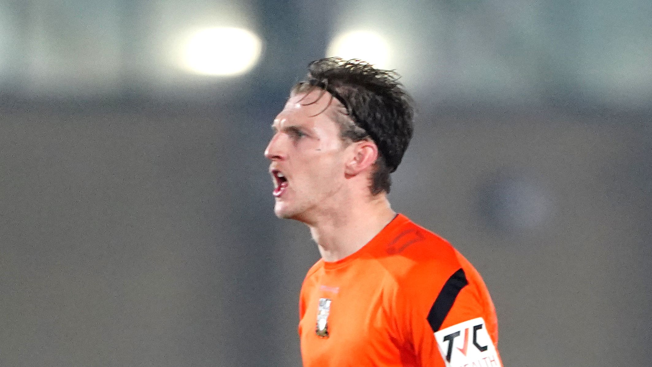 Barnet’s Danny Collinge celebrates after the Emirates FA Cup first round replay match at the Melbourne Stadium, Chelmsford. Picture date: Monday November 14, 2022.