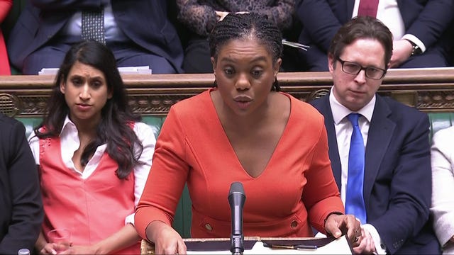 Kemi Badenoch standing while speaking at despatch box in the Commons