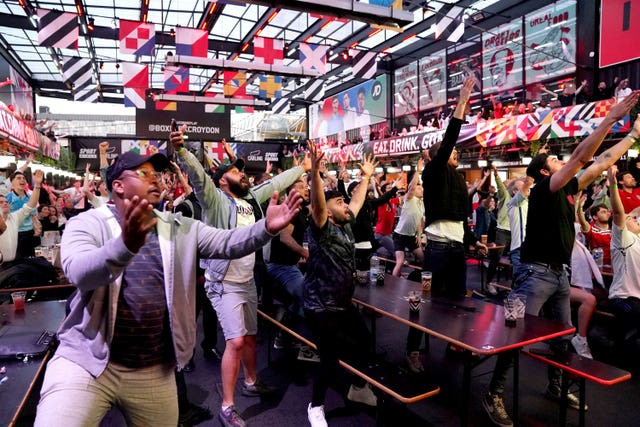 Fans watching England v Denmark