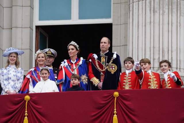 Prince George points at the flyover as it passes over Buckingham Palace (Stefan Rousseau/PA)