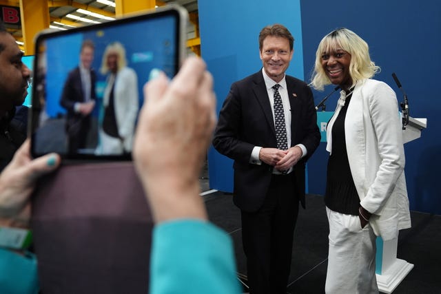 Richard Tice posing for a photo after a speech at a Reform UK press conference