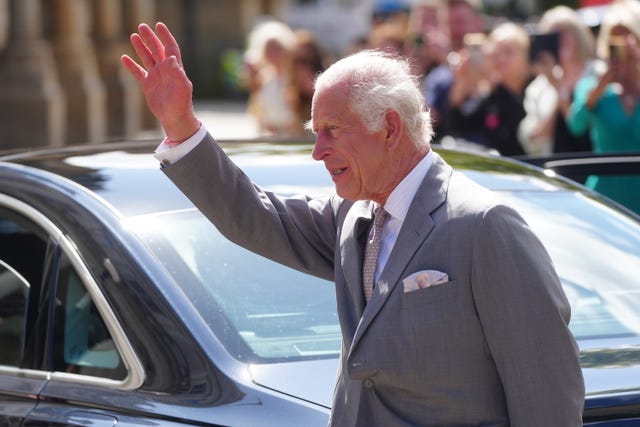 The King waves as he leaves Southport Town Hall 