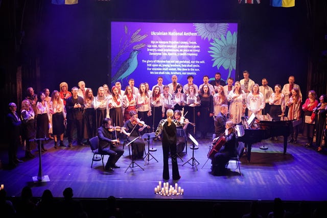 Ukrainian rockstar Svyatoslav Vakarchuk, Songs for Ukraine, and the Royal Opera House quartet perform the Ukrainian National Anthem during the United With Ukraine show, an event for the Ukrainian refugee community in London, to mark two years since the Russian invasion, at the Palace Theatre in London