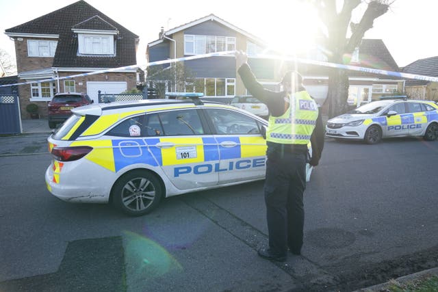 Police at the scene in Heath Road, Christchurch, Dorset, where police have launched a murder investigation following the discovery of the body of a man in his 30s at a property on Tuesday evening. Picture date: Wednesday January 5, 2022.