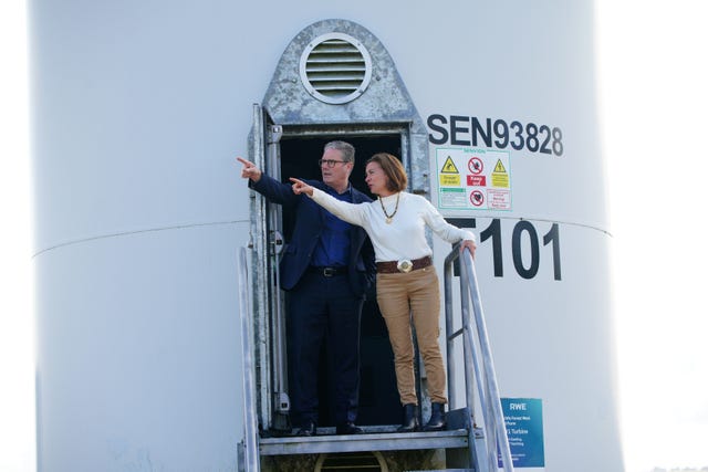 Dame Eluned Morgan, seen here pointing with Sir Keir Starmer during a visit to Brechfa Forest West Wind Farm in South Wales in August