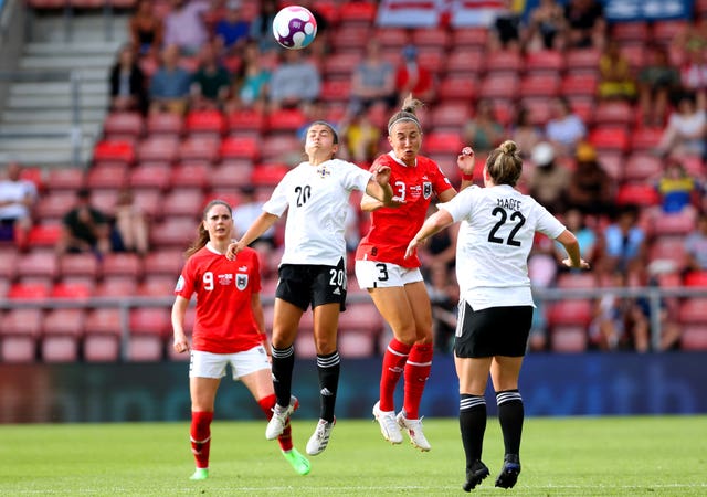 Northern Ireland’s Joely Andrews, left, challenges Austria goal-scorer Katharina Naschenweng during Monday's 2-0 loss at St Mary's