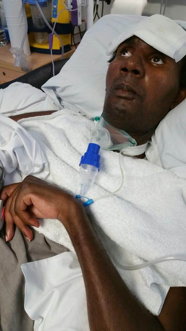 Marvin Couson lying in a hospital bed.