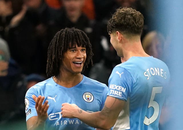 Nathan Ake, left, celebrates with John Stones after scoring against Leeds