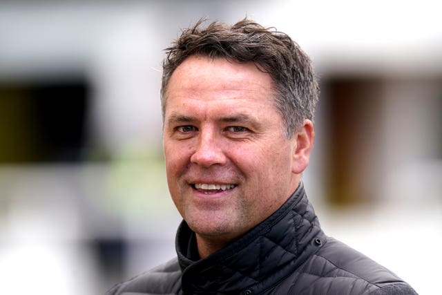 Michael Owen cut a delighted figure at Newmarket