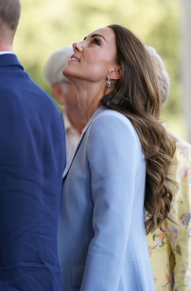 The Duchess of Cambridge looks up as she arrives with her husband the Duke of Cambridge at the Fitzwilliam Museum in Cambridge 