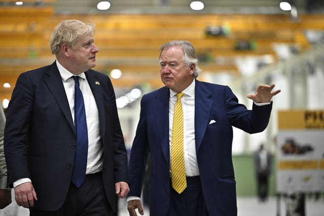 Prime Minister Boris Johnson (left) with Lord Bamford (Ben Stansall/PA)