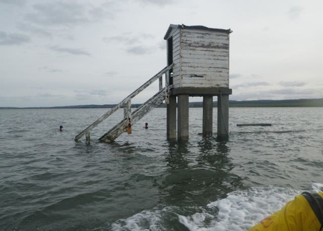 The refuge box on Holy Island causeway where the occupant of a submerged horsebox was found