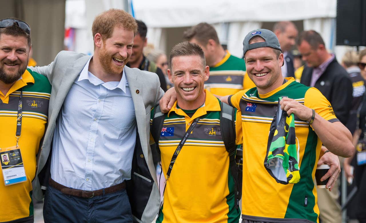 In Pictures Harry gets up close and personal with pair of ‘budgie