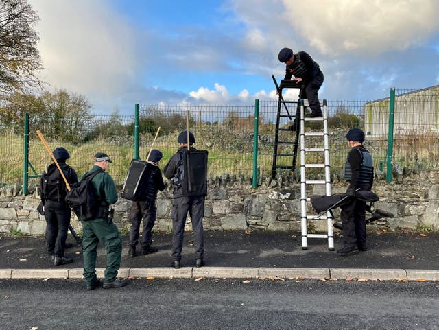 Army search teams assisted by the PSNI at the scene