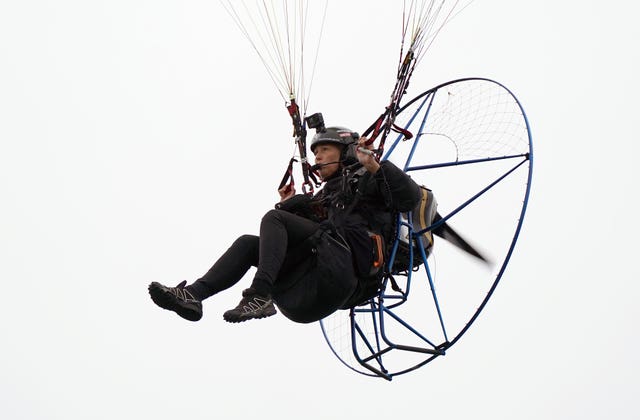 Sacha Dench in flight on a paramotor