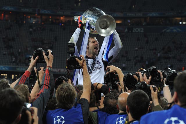 Petr Cech celebrates with the Champions League trophy after Chelsea won the final in 2013