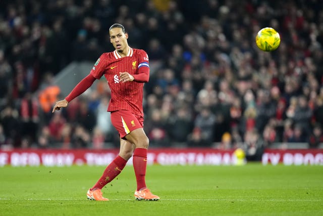 Liverpool’s Virgil van Dijk clears the ball