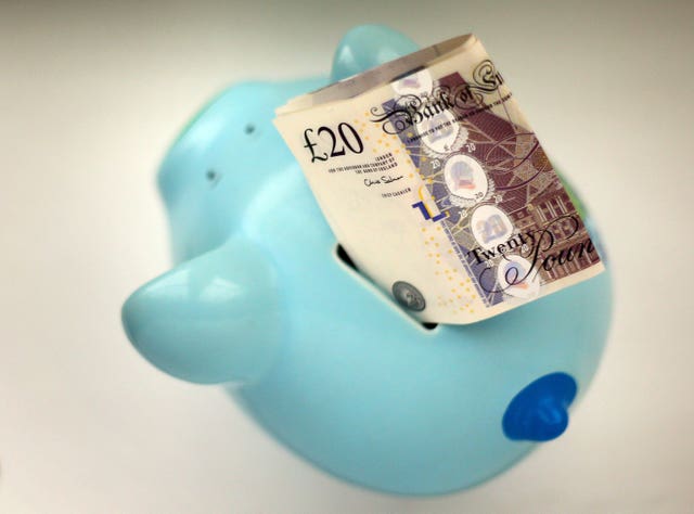 Money in a piggy bank (Gareth Fuller/PA)