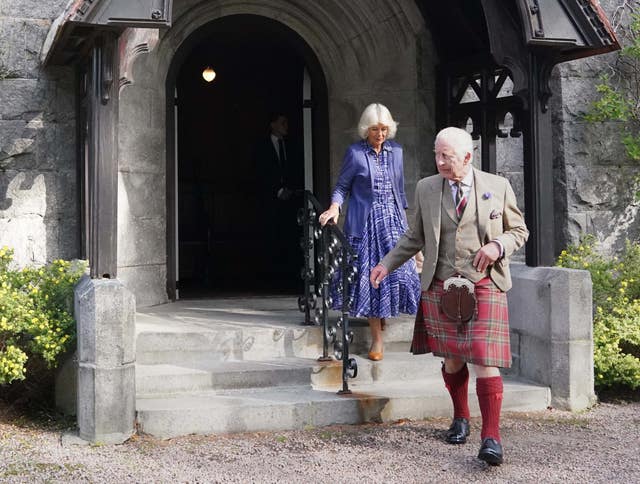 The King and Queen leave Crathie Parish Church, near Balmoral, after a church service, to mark the first anniversary of the death of Queen Elizabeth II