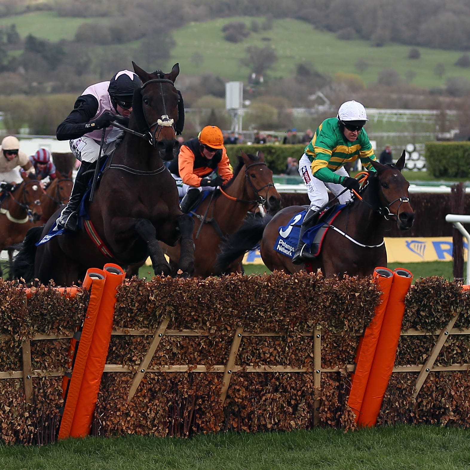 Sire Du Berlais (right) on his way to winning the Pertemps Final