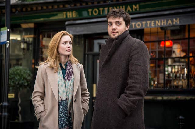 Holliday Grainger as Robin Ellacott and Tom Burke as Cormoran Strike in The Strike Series for BBC and HBO 