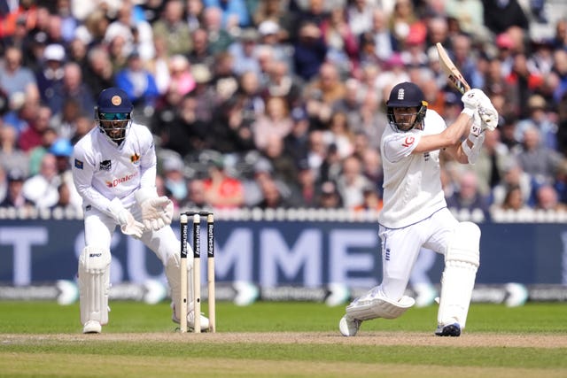 England’s Mark Wood hits a shot through the off-side (Nick Potts/PA)