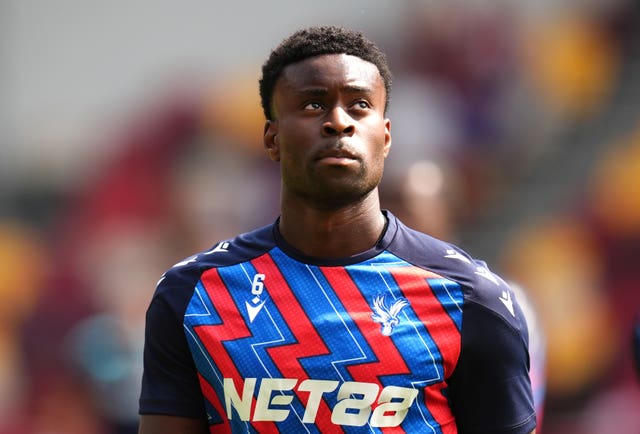 Crystal Palace defender Marc Guehi warming up prior to kick-off before the Premier League match at the Gtech Community Stadium against Brentford