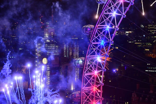 Fireworks light up the sky over the London Eye