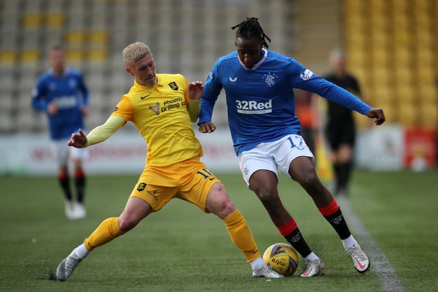 Joe Aribo (right) had to cover in at left-back as Gers won at Livingston