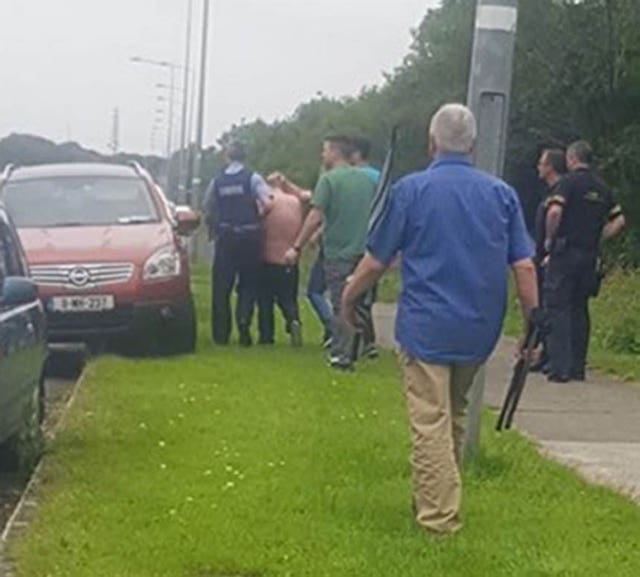 A man is detained following the incident at St Patrick’s cemetery
