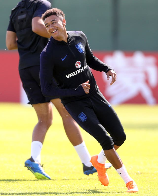 Lingard smiles during an England training session