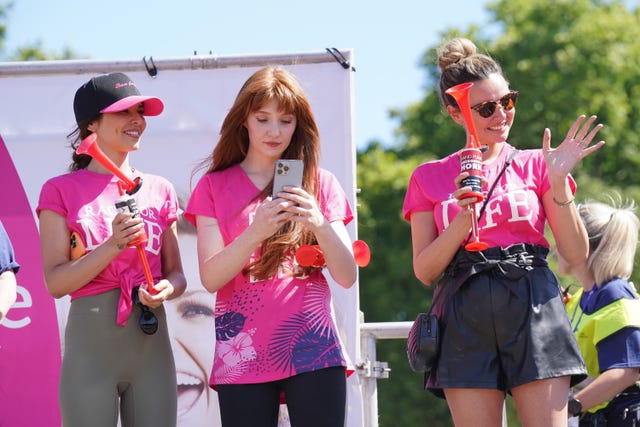Cheryl, Nicola Roberts and Nadine Coyle with air horns start the Race For Life For Sarah at Hyde Park