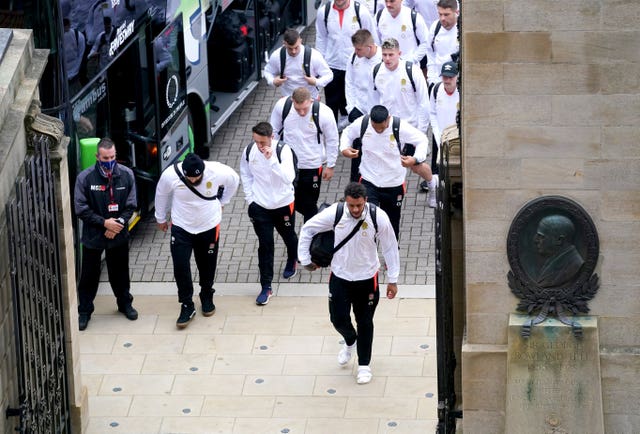 Courtney Lawes leads the England team into Twickenham