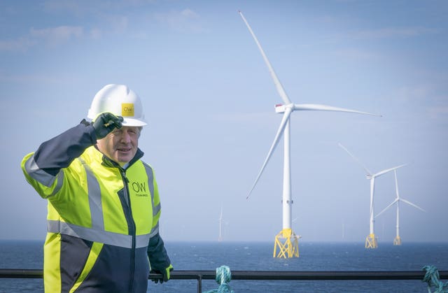 Mr Johnson onboard the Esvagt Alba during a visit to the Moray Offshore Windfarm East, off the Aberdeenshire coast (Jane Barlow/PA)