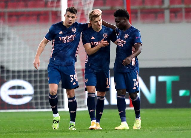  Martin Odegaard (centre) scored his first goal for Arsenal