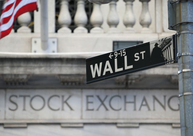 A Wall Street sign outside the New York Stock Exchange (Martin Keene/PA)