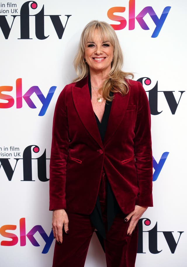 Tamzin Outhwaite at an award ceremony wearing a red suit