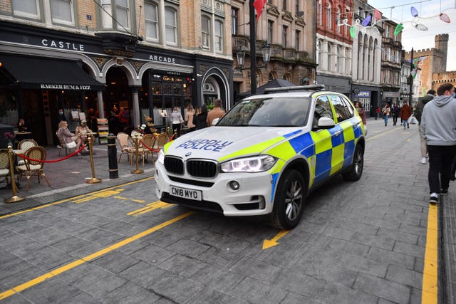 A police car on patrol in Cardiff (Ben Birchall/PA)