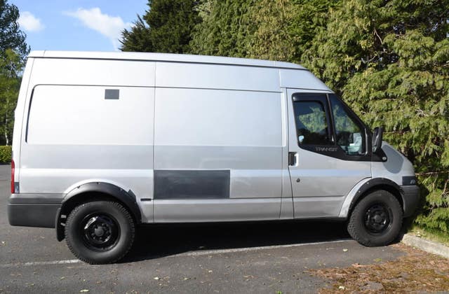 A silver Ford Transit