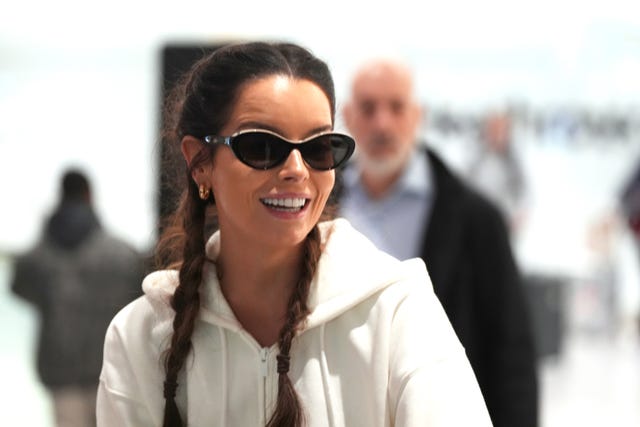 Maura Higgins dressed in a white jumper and wearing sunglasses