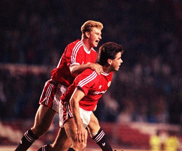 Mark Robins (left) during his days as a Red Devil.