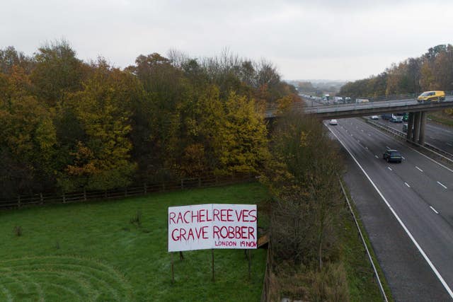 A sign in a field by the M40 near Warwick, protesting against changes to inheritance tax rules for farmers