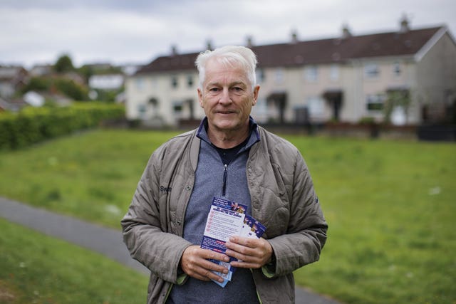 UUP Westminster candidate Tim Collins has his picture taken while campaigning in the Kilcooley estate area of Bangor