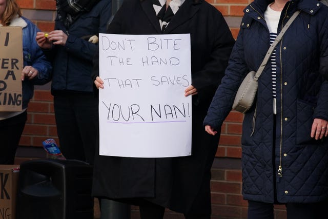 Members of the Royal College of Nursing (RCN) on the picket line outside Leeds General Infirmary, West Yorkshire