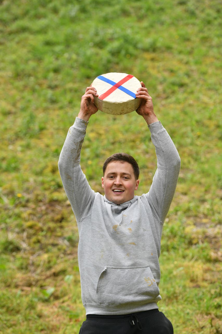 New champion savours success as he hurtles to glory in cheese rolling