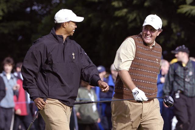 Tiger Woods and Phil Mickelson are long-time Ryder Cup team-mates (Rebecca Naden/PA).